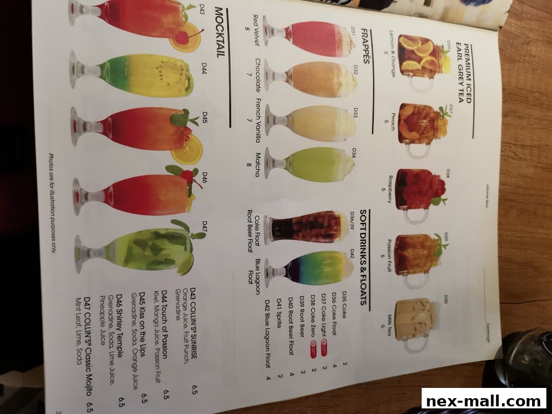 A menu page displaying various mocktails, frappes, soft drinks, and floats with colorful illustrations.