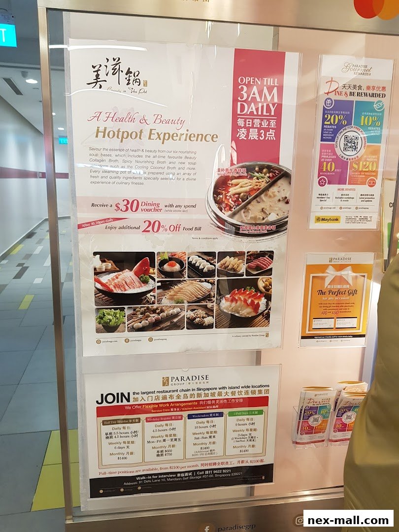 A display board for Beauty in The Pot at NEX, showcasing hotpot experience and job opportunities.