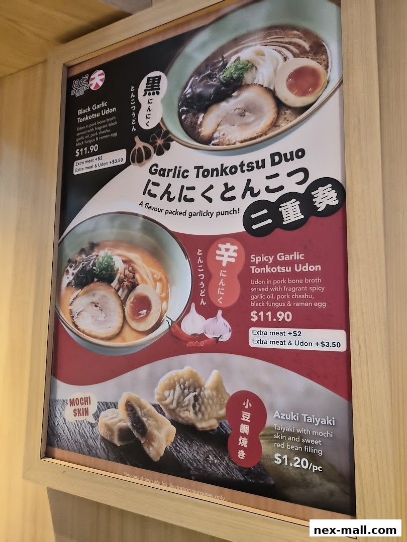 A menu board showcasing various udon dishes and a dessert item.