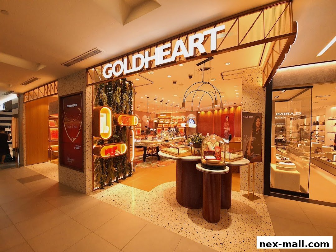 The entrance of Goldheart Jewelry store, showcasing elegant displays and jewelry.