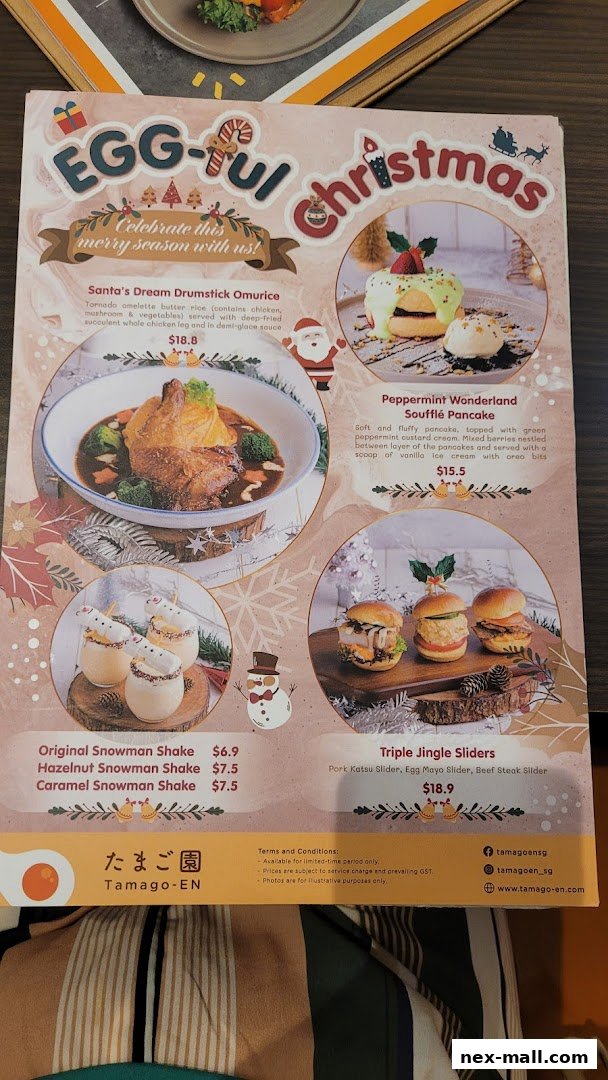 A Christmas-themed menu from Tamago-EN featuring festive dishes and drinks.