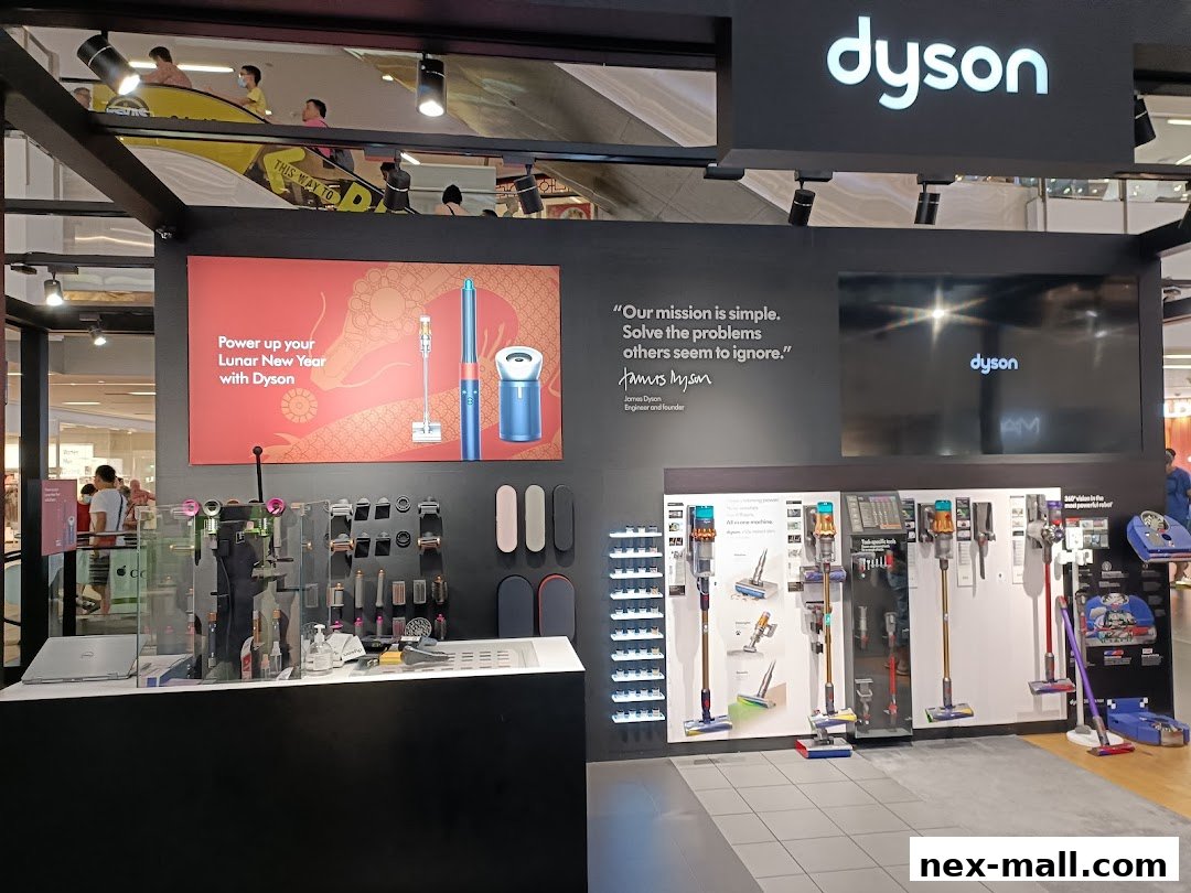 Dyson store display featuring vacuum cleaners and accessories, with a Lunar New Year promotion.
