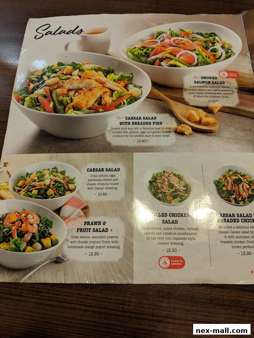 A menu page showcasing various salad options with appetizing images and descriptions.