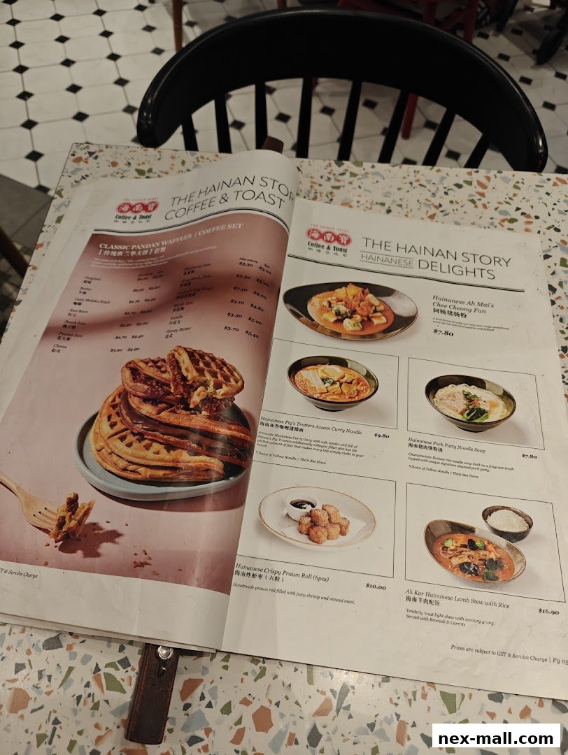 A menu from The Hainan Story Coffee House featuring waffles and Hainanese delights.