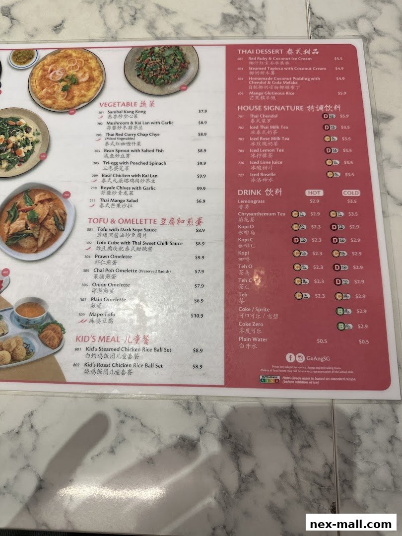 A menu from Go-Ang Pratunam Chicken Rice featuring Thai dishes, desserts, drinks, and kids' meals.