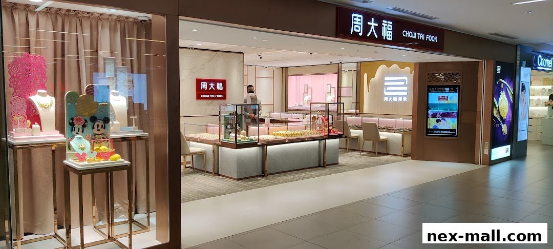 Chow Tai Fook Jewellery store interior with display cases and jewelry.