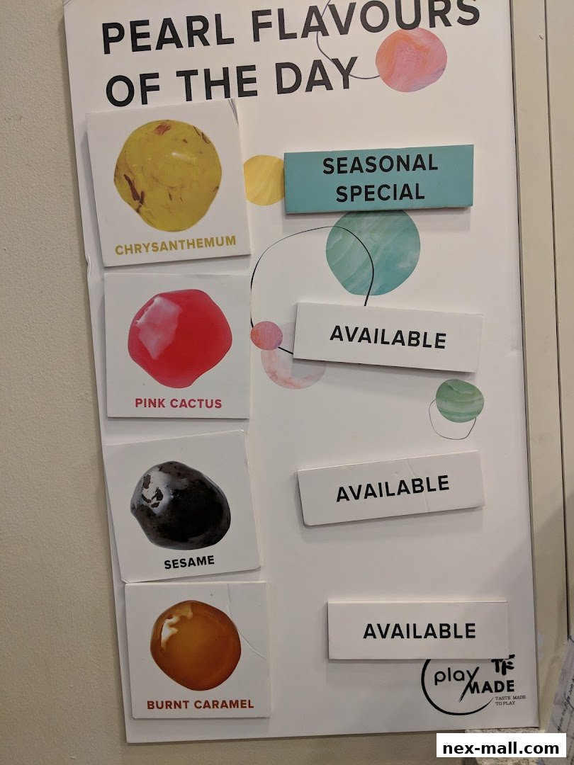 A display board showing available pearl flavors of the day at PlayMade.
