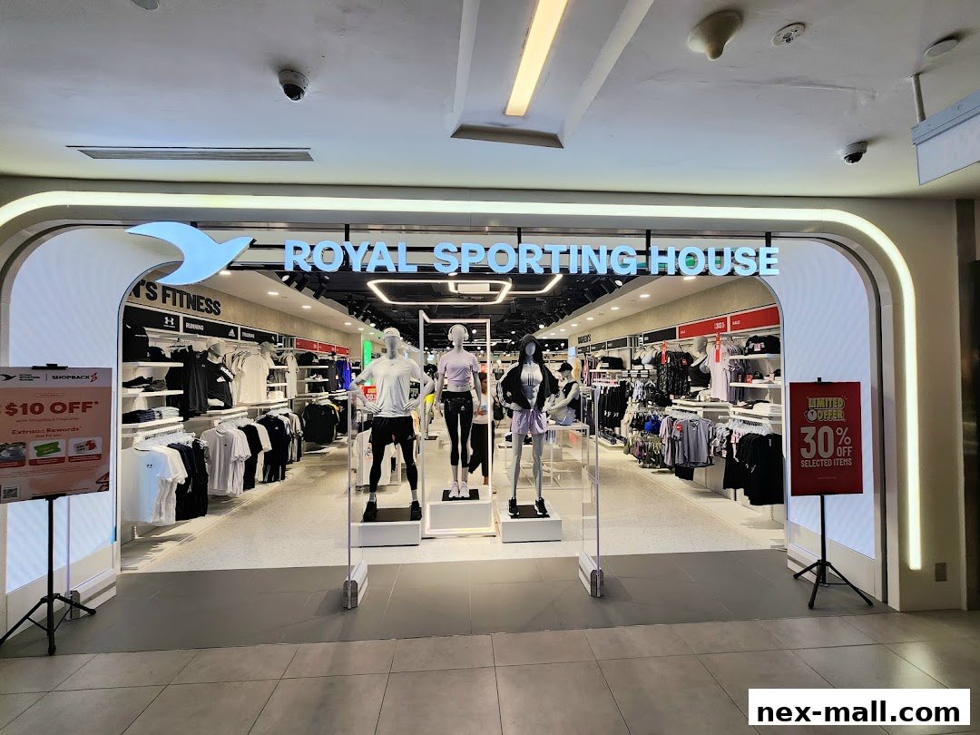 The entrance to Royal Sporting House, showcasing athletic wear and mannequins.