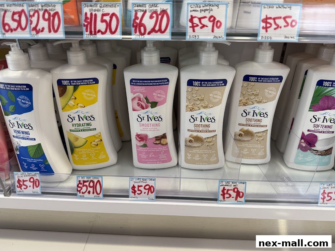 A display of St. Ives body lotions with various scents and ingredients, priced individually.