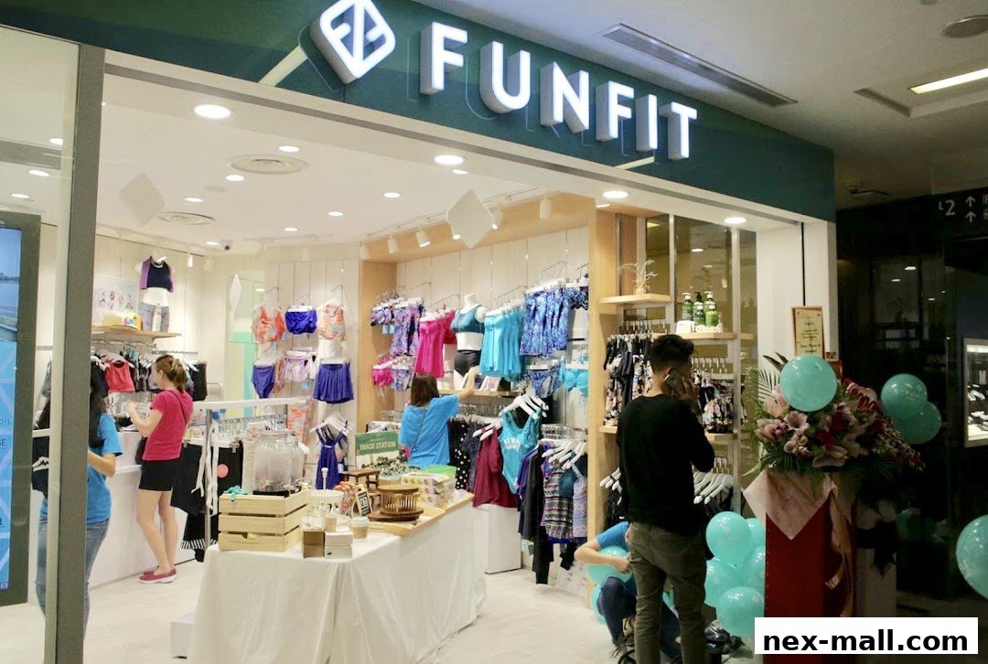 A brightly lit retail store interior showcasing swimwear and activewear, with customers browsing.