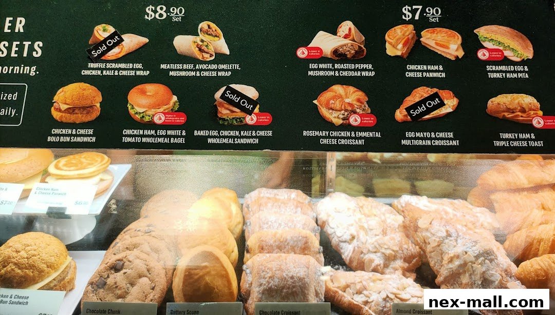 A display of various sandwiches, wraps, and pastries offered at Starbucks.