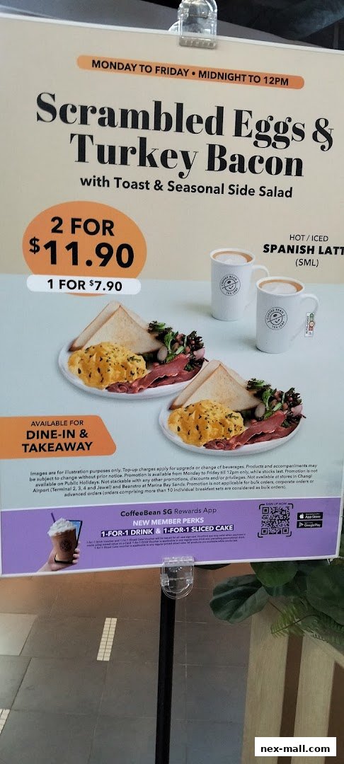 A promotional poster for The Coffee Bean & Tea Leaf featuring a breakfast set and Spanish Latte.