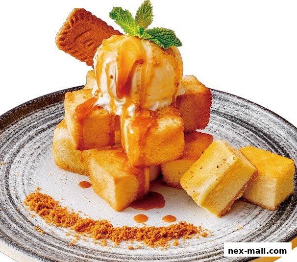 A delicious dessert featuring honey toast cubes topped with ice cream and caramel sauce.