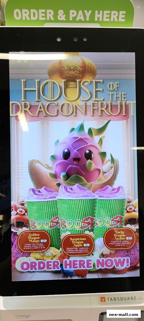 A digital menu display for Boost Juice featuring 'House of the Dragon Fruit' themed drinks.