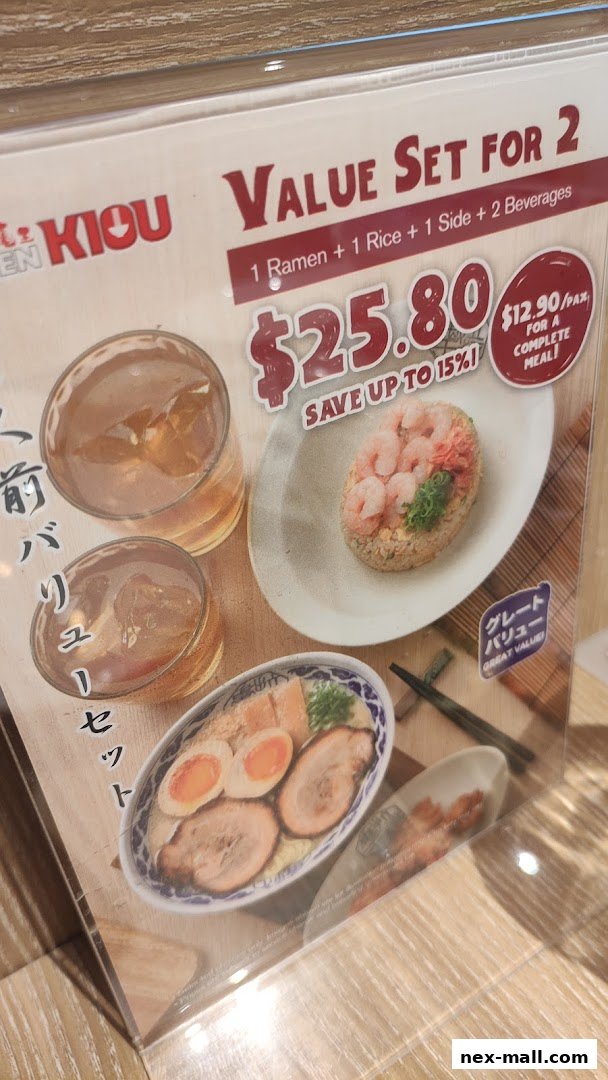 A value set for two featuring ramen, rice, side dish, and beverages.