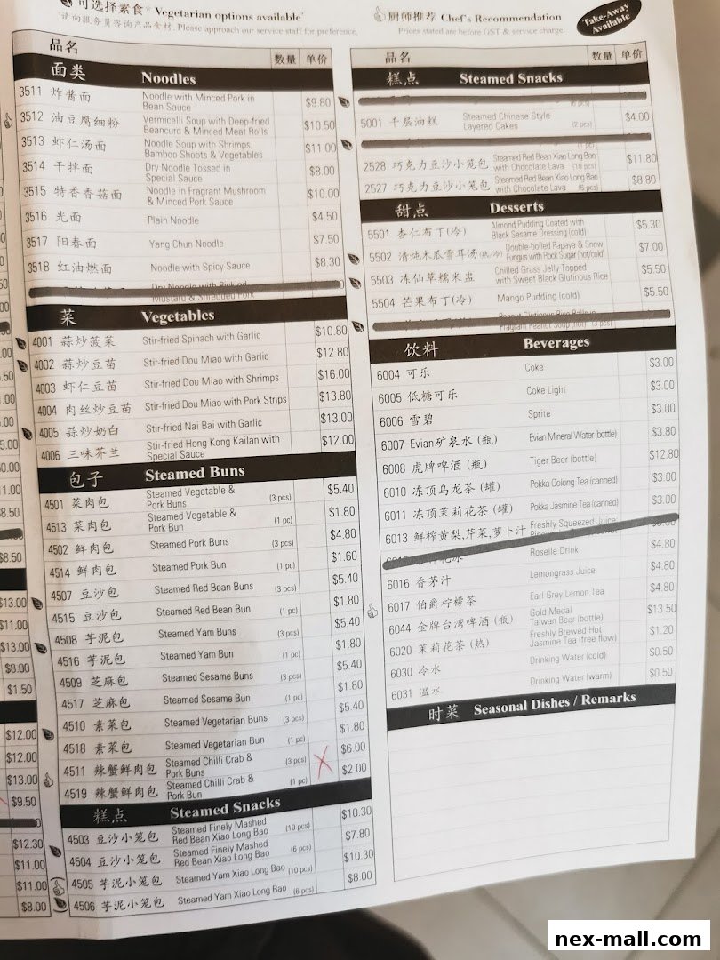 A menu from Din Tai Fung featuring noodles, vegetables, steamed buns, snacks, desserts, beverages, and seasonal dishes.