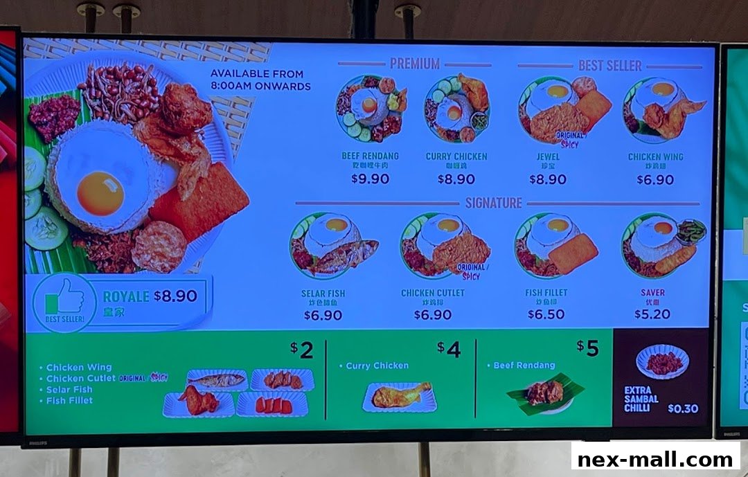 A digital menu board displaying various Nasi Lemak dishes with prices and images.