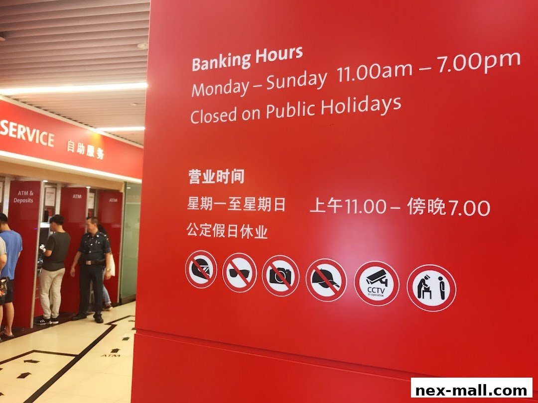 OCBC Bank NEX branch with ATMs and banking hours displayed in English and Chinese.