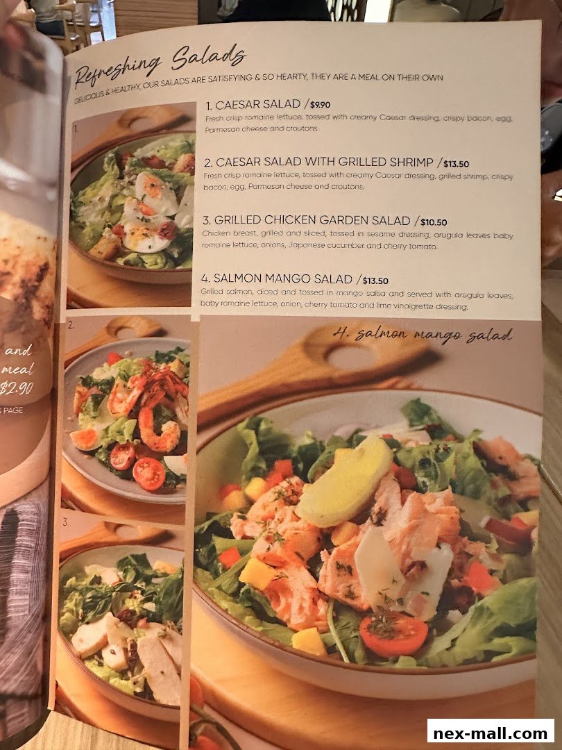 A menu page showcasing four different refreshing salad options with descriptions and prices.