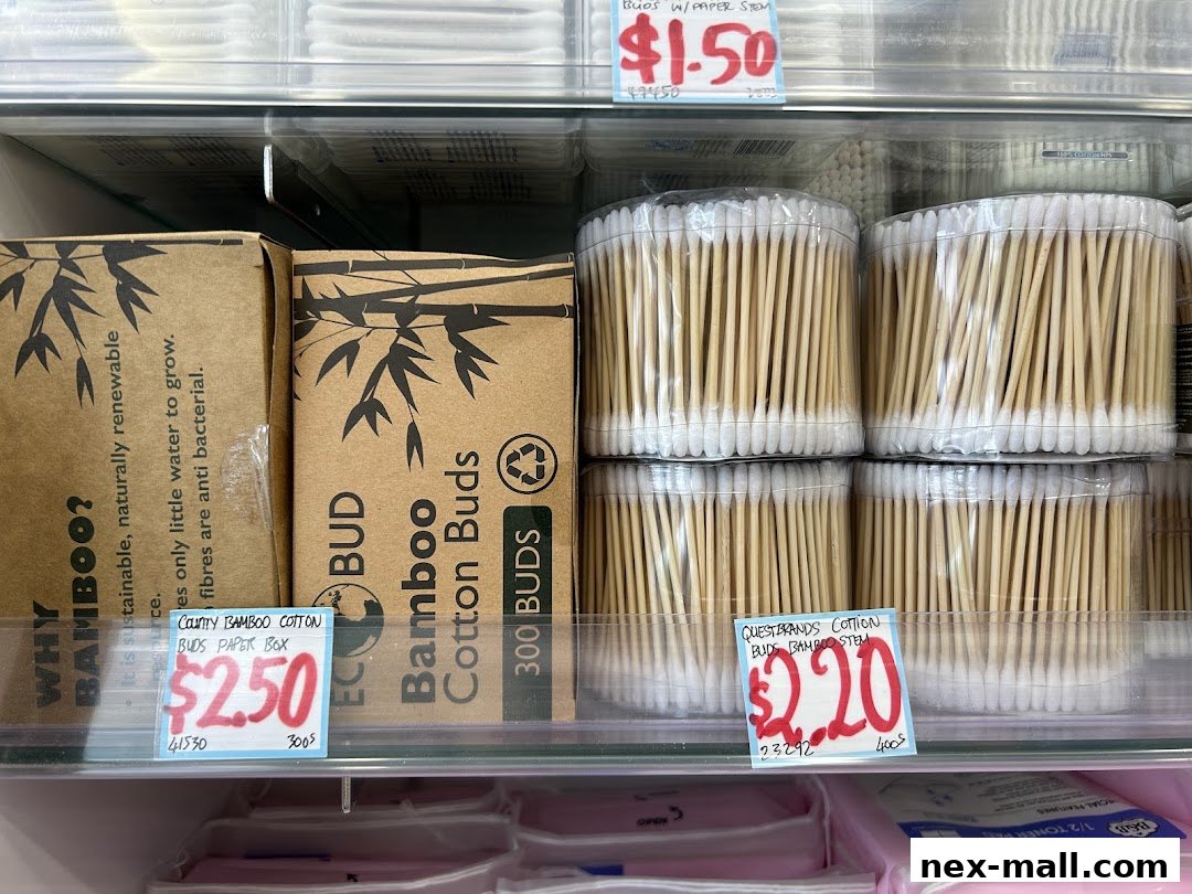 A display of bamboo cotton buds with prices shown on tags.