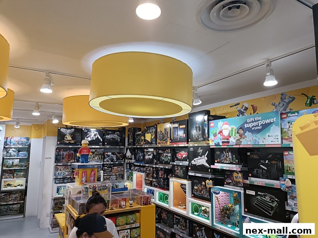 Interior view of a LEGO store showcasing various LEGO sets and displays.
