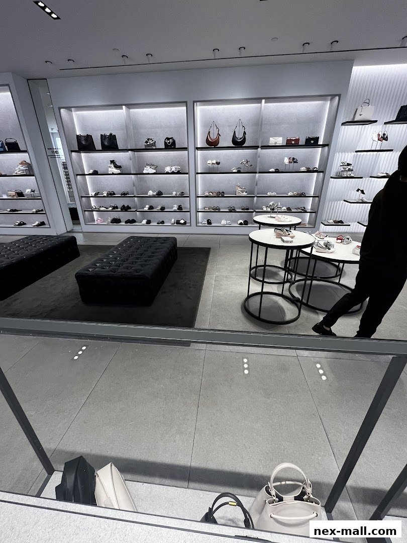 Interior view of a Charles & Keith store showcasing handbags and shoes on display shelves.