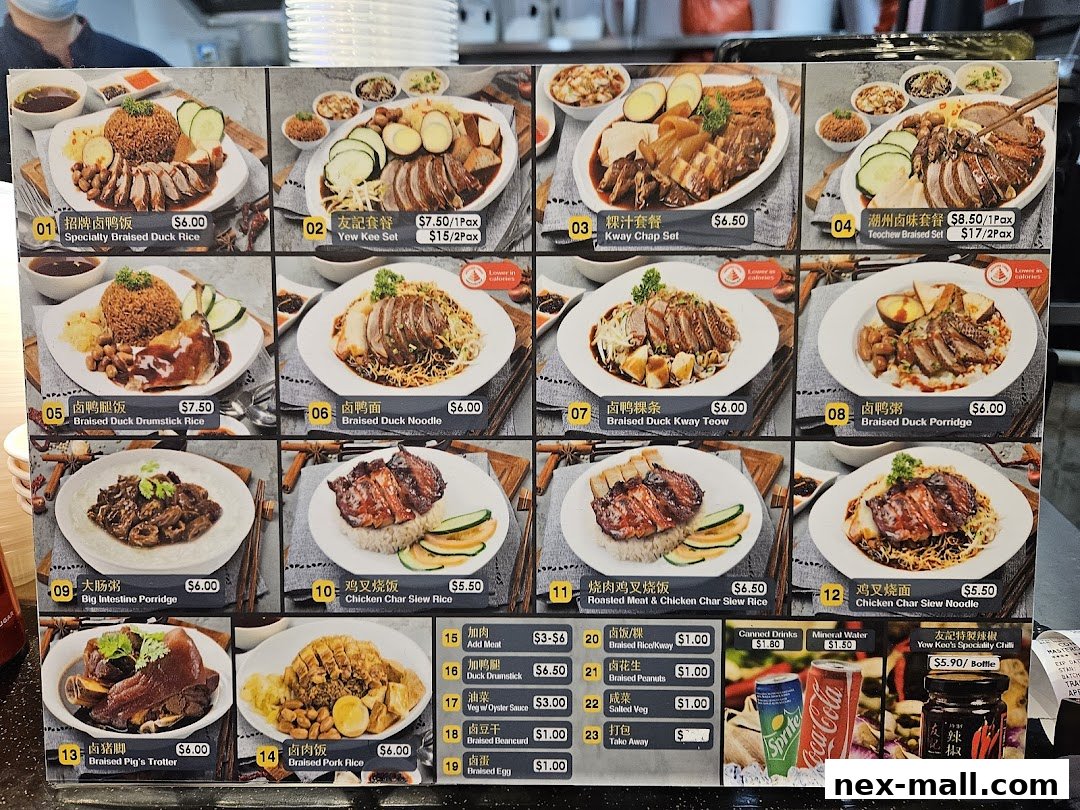 A menu board displaying various braised duck and pork dishes with prices.
