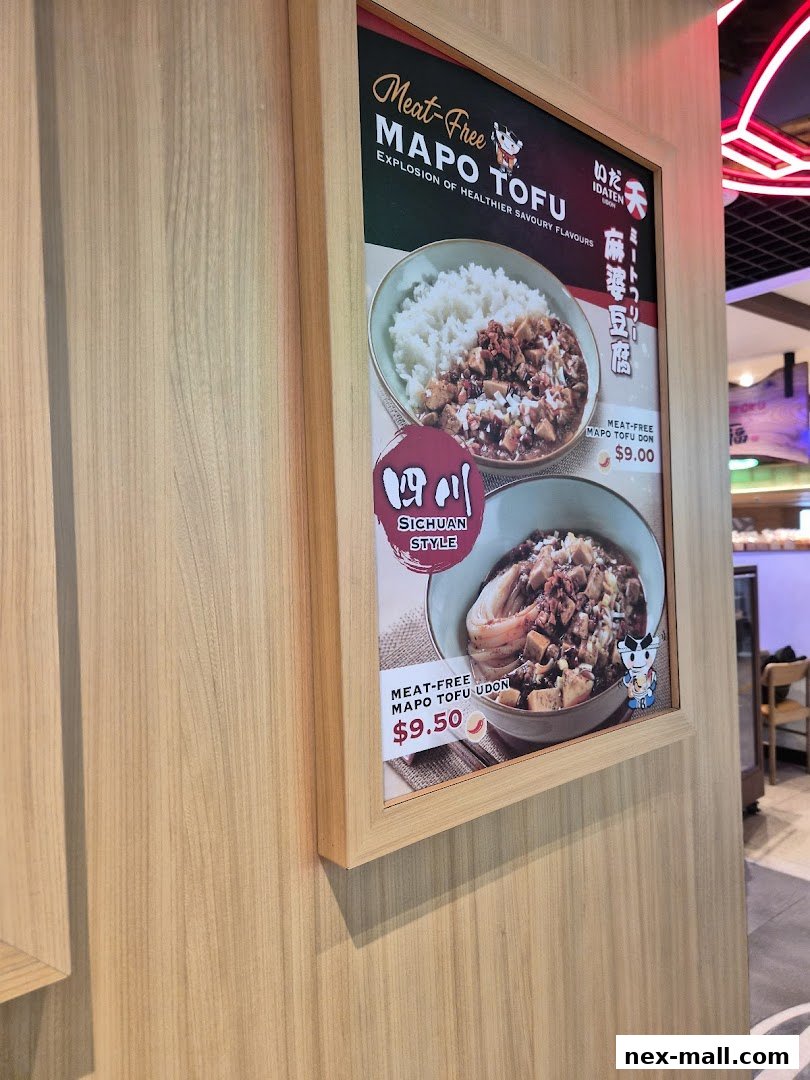 A poster advertising Meat-Free Mapo Tofu dishes at Idaten Udon.