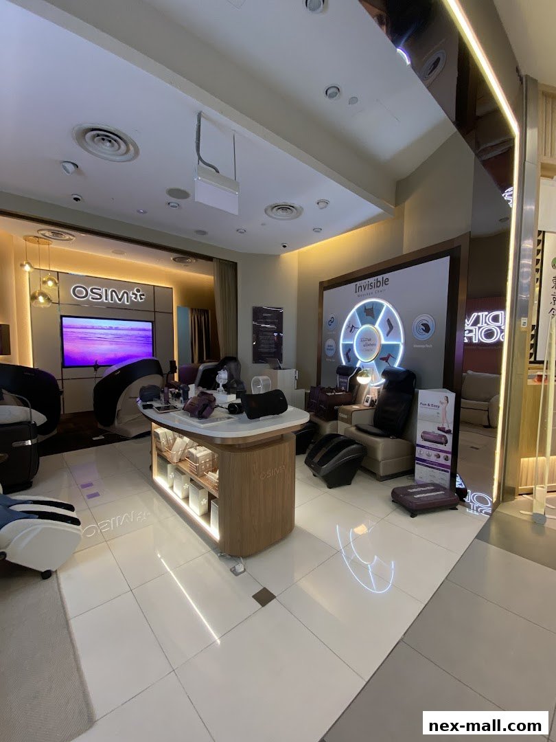 Interior of an OSIM Nex shop showcasing massage chairs and foot massagers.