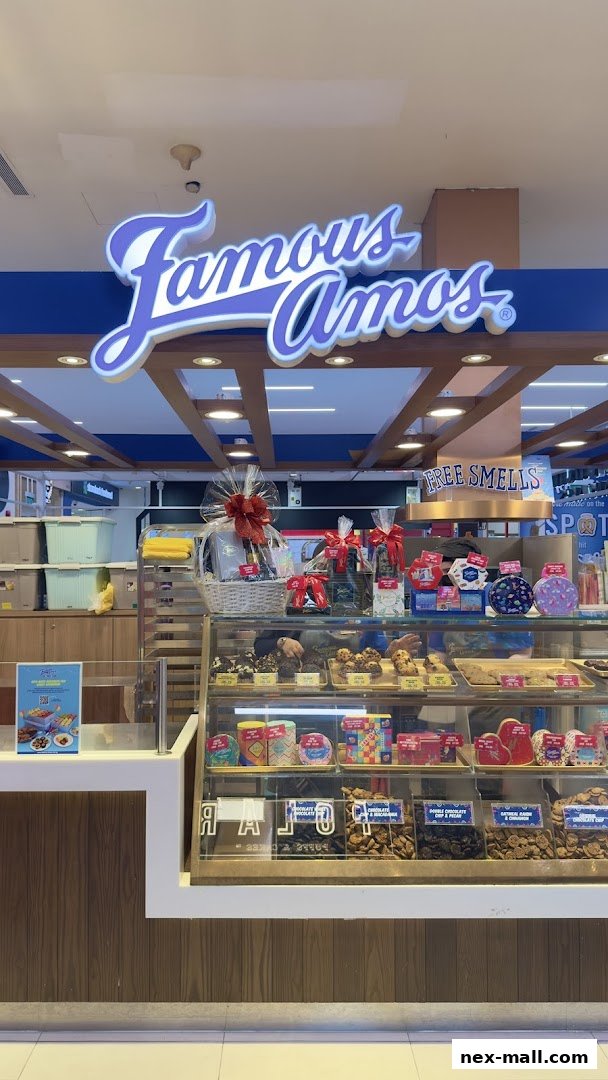 Famous Amos cookie shop with a display of cookies and gift baskets.
