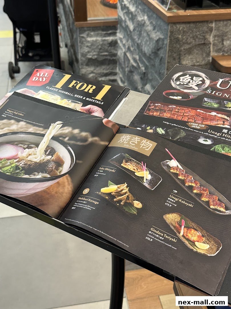 A menu from Aburi-EN Nex featuring Japanese dishes and drinks.