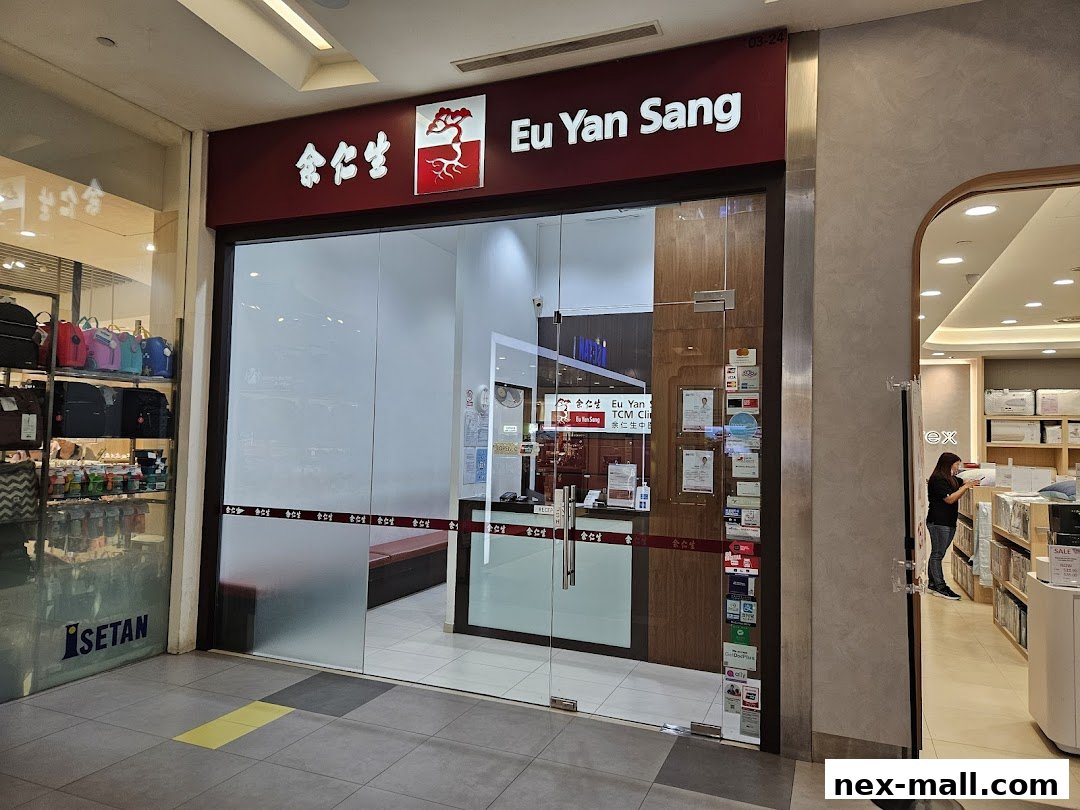 The exterior of the Eu Yan Sang TCM Clinic at Serangoon NEX, featuring its prominent signage and glass entrance.