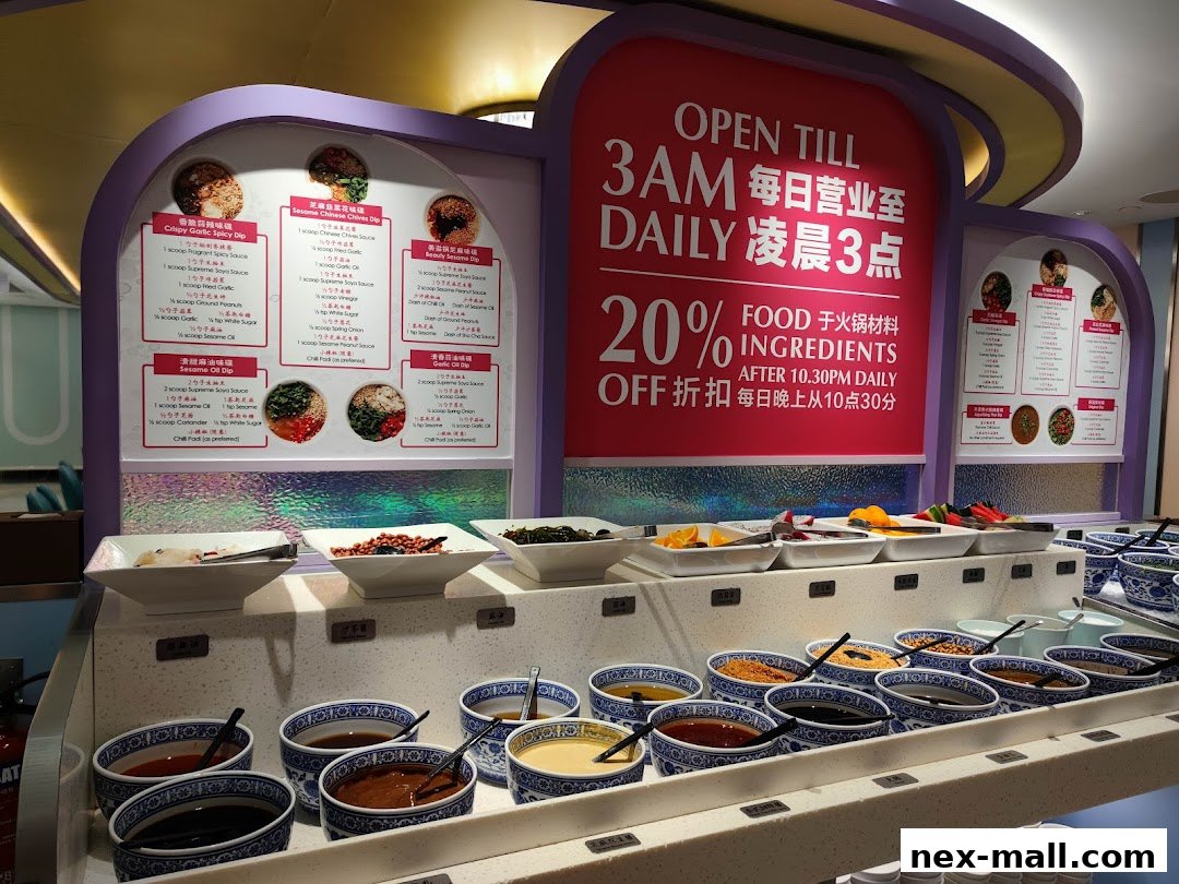 A display of various dipping sauces and ingredients at a hot pot restaurant.