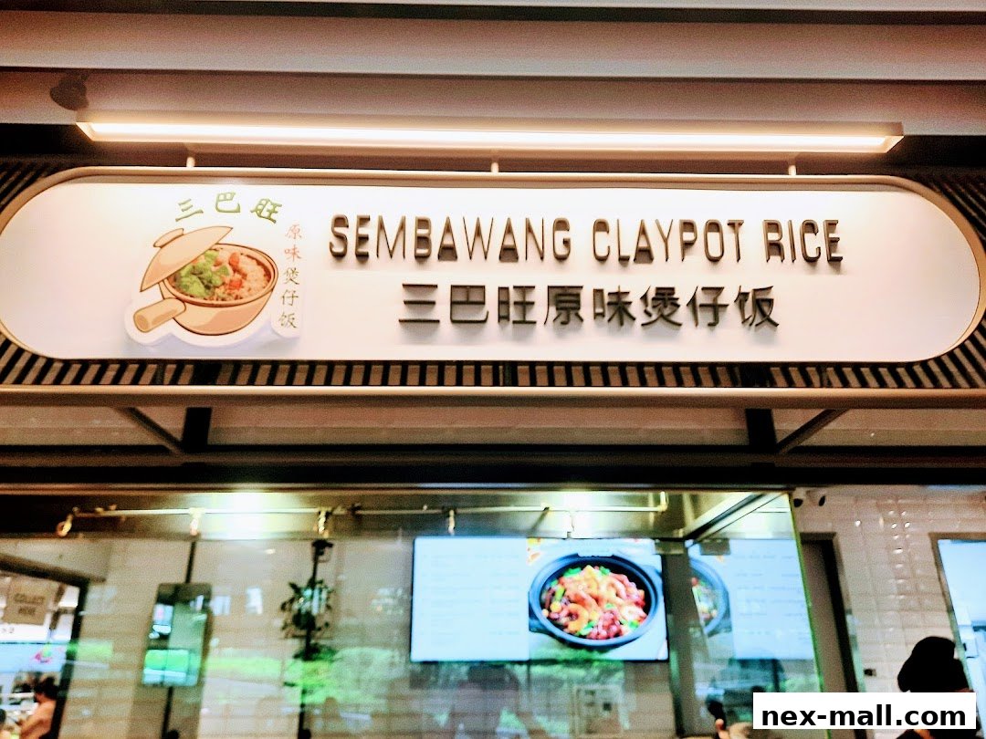 A sign for Sembawang Claypot Rice with an illustration of a claypot.