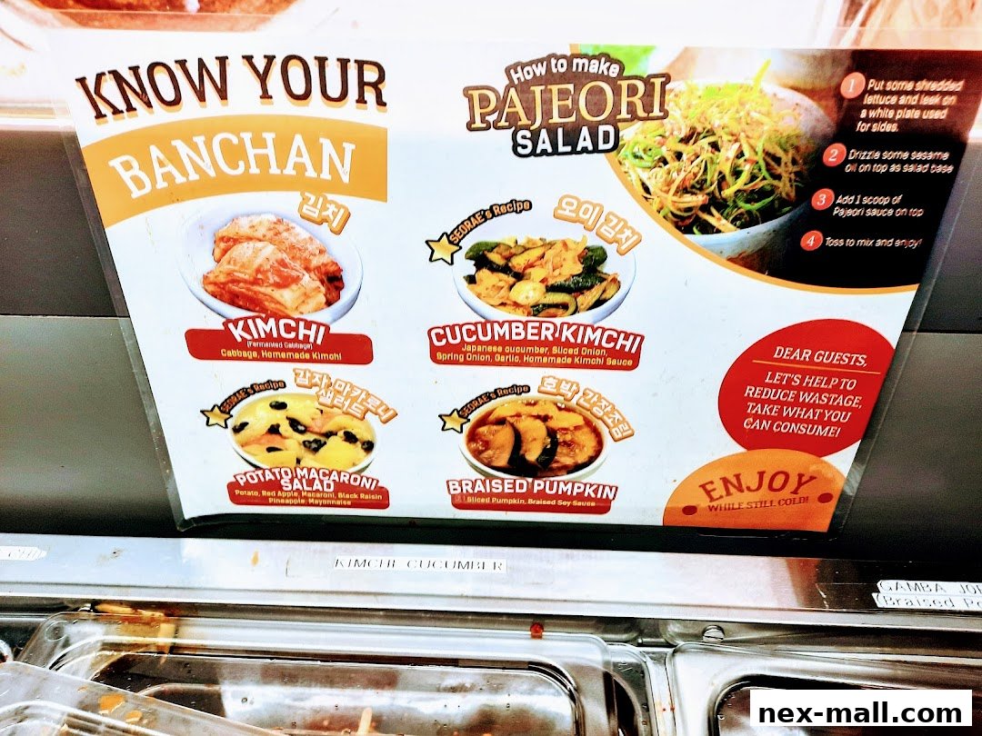 A sign displaying various Korean banchan dishes and how to make Pajeori salad.