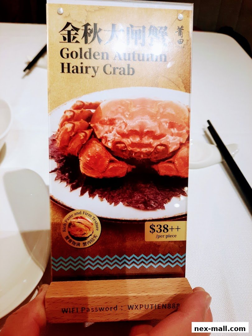 A menu item for Golden Autumn Hairy Crab with price and description.