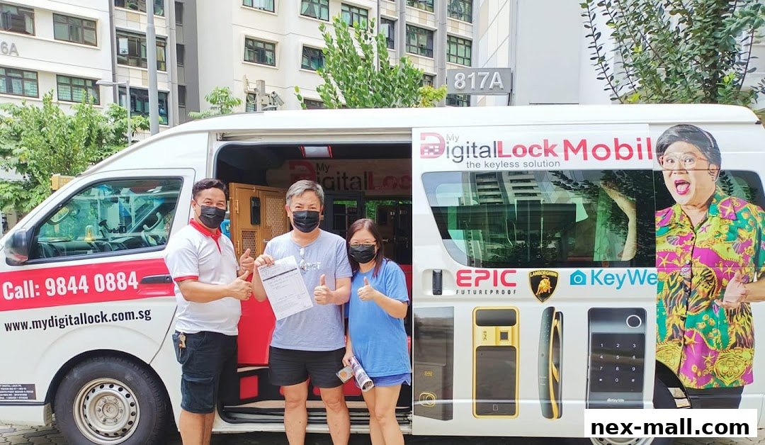 Three people stand in front of a van branded "My Digital Lock Mobil" showcasing digital locks.