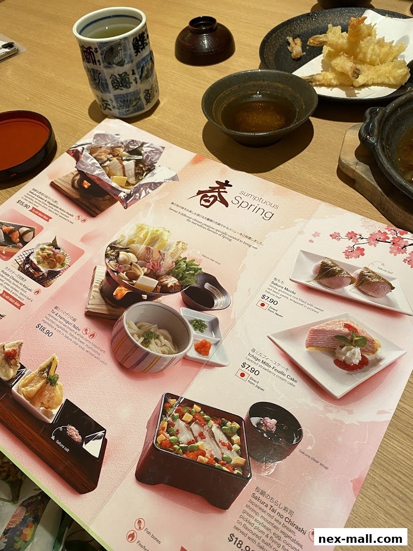 A Japanese restaurant menu featuring spring-themed dishes with vibrant food photography.