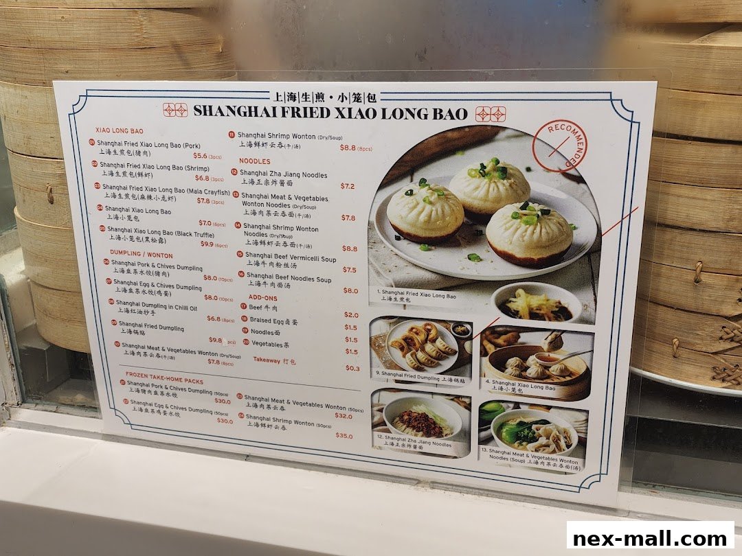 A menu for Shanghai Fried Xiao Long Bao, featuring various dumplings, noodles, and frozen take-home packs.