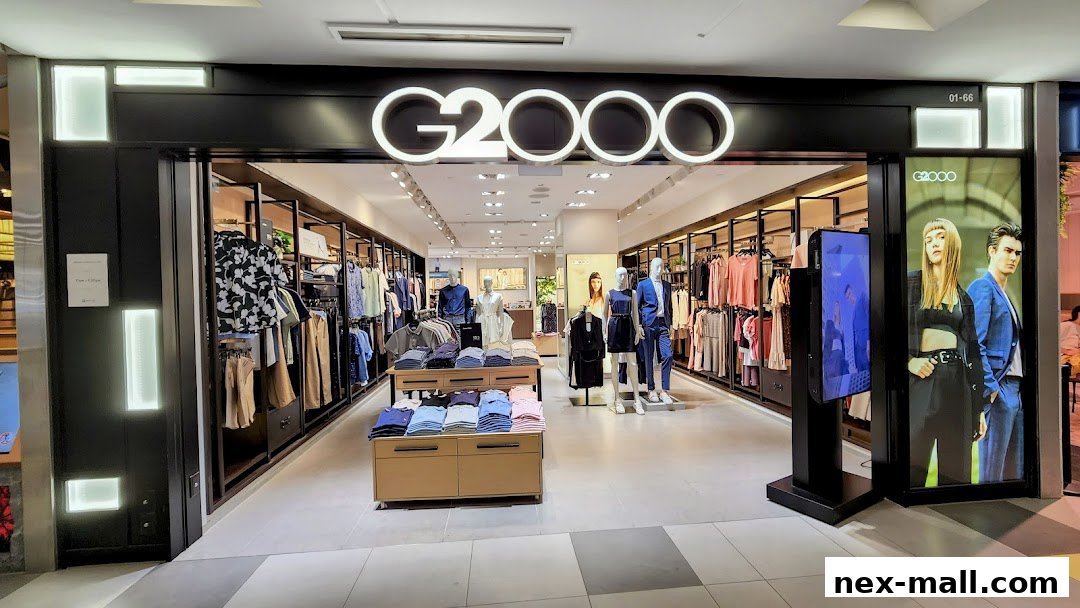 The G2000 shop front displays a wide selection of men's and women's apparel on racks and display tables.