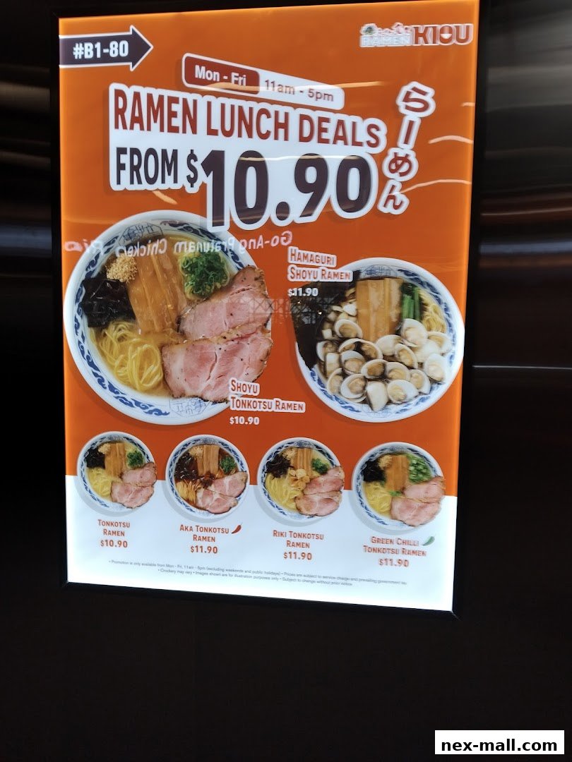 A brightly lit menu board advertising ramen lunch deals from $10.90.