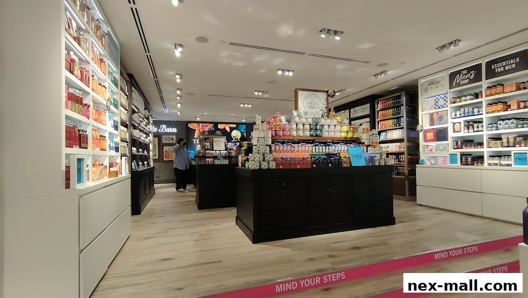 Interior view of a Bath & Body Works store showcasing shelves filled with candles and body care products.