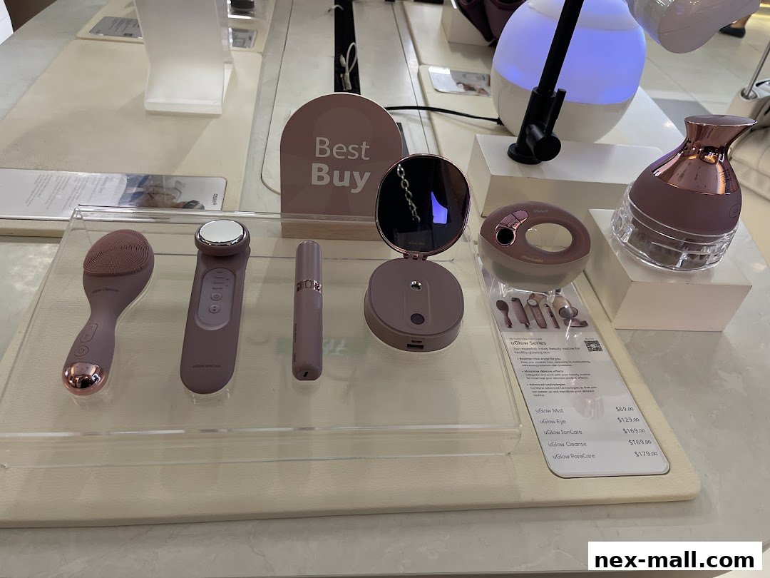 A display of various beauty devices from the uGlow series, including facial cleansing and treatment tools.