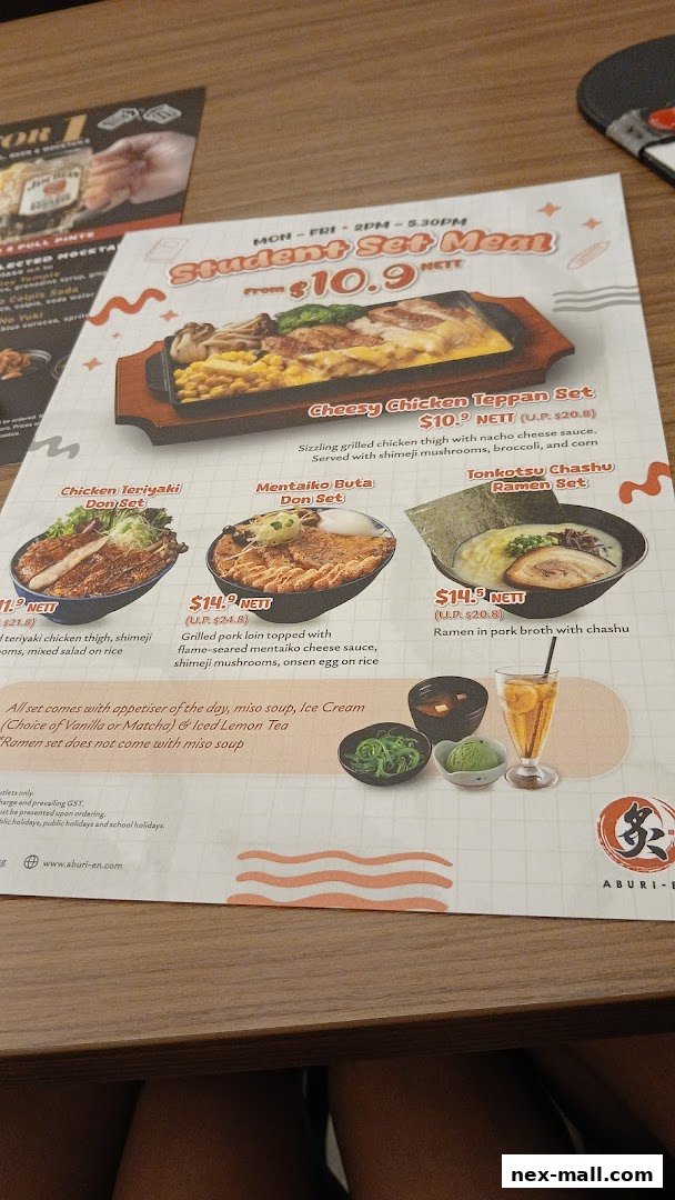 A menu from Aburi-EN Nex featuring student set meals with various Japanese dishes.
