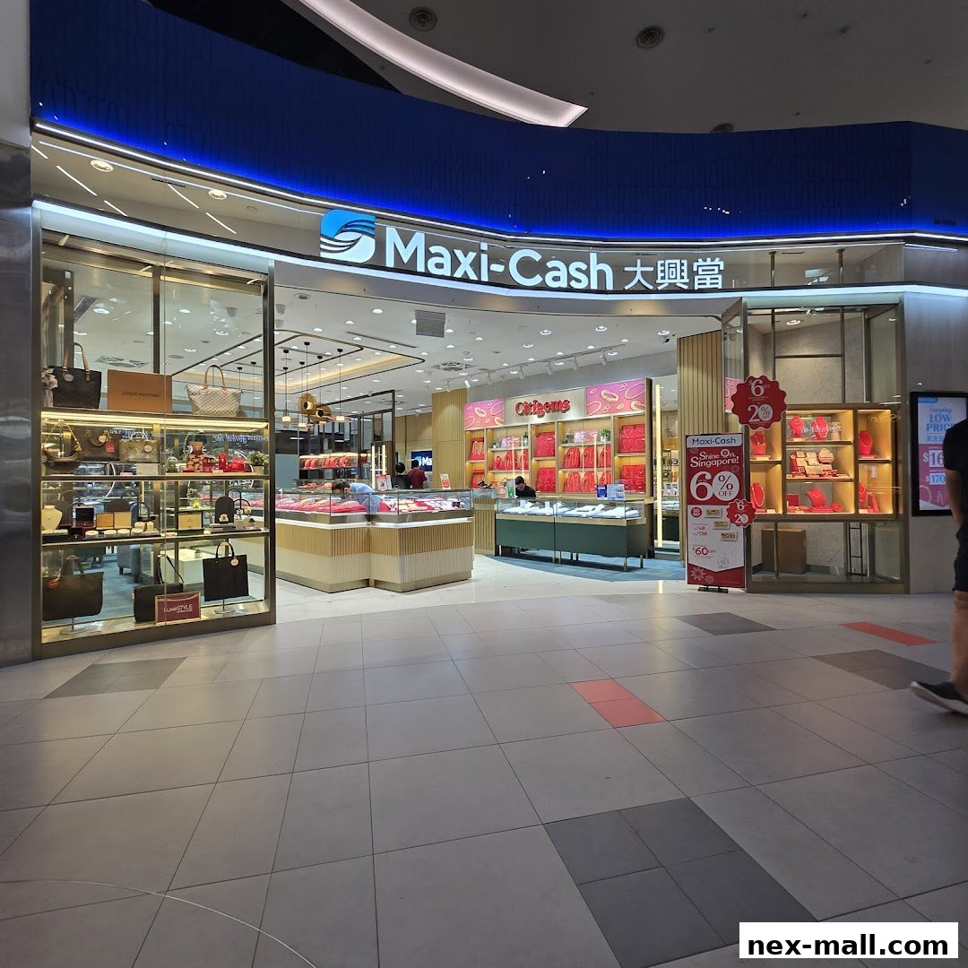 The entrance of Maxi-Cash, a pawnshop and retailer, displaying jewelry and luxury goods.