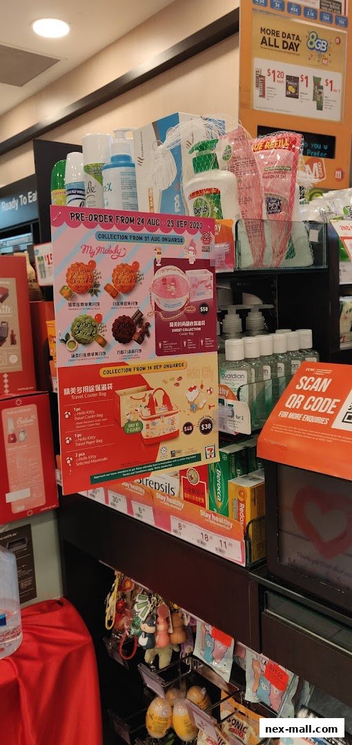 A display of promotional items and products at a 7-Eleven store, featuring pre-orders and special collections.
