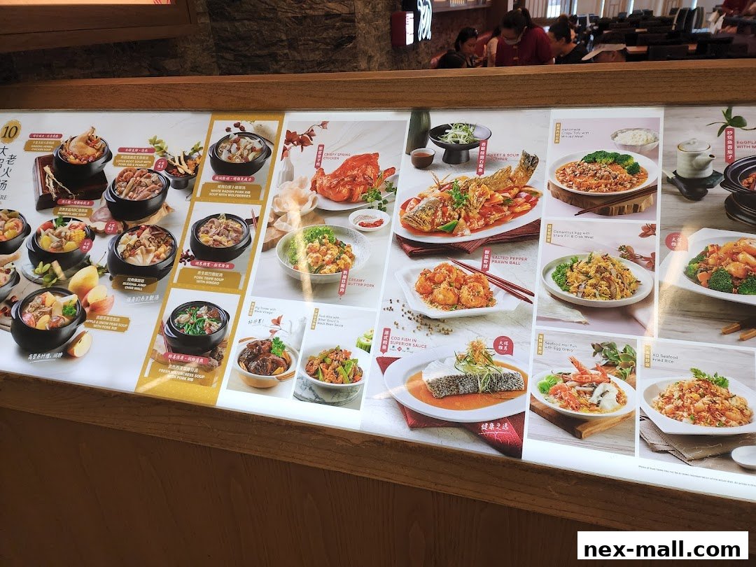 A display menu showcasing various Chinese dishes with appetizing food photography.