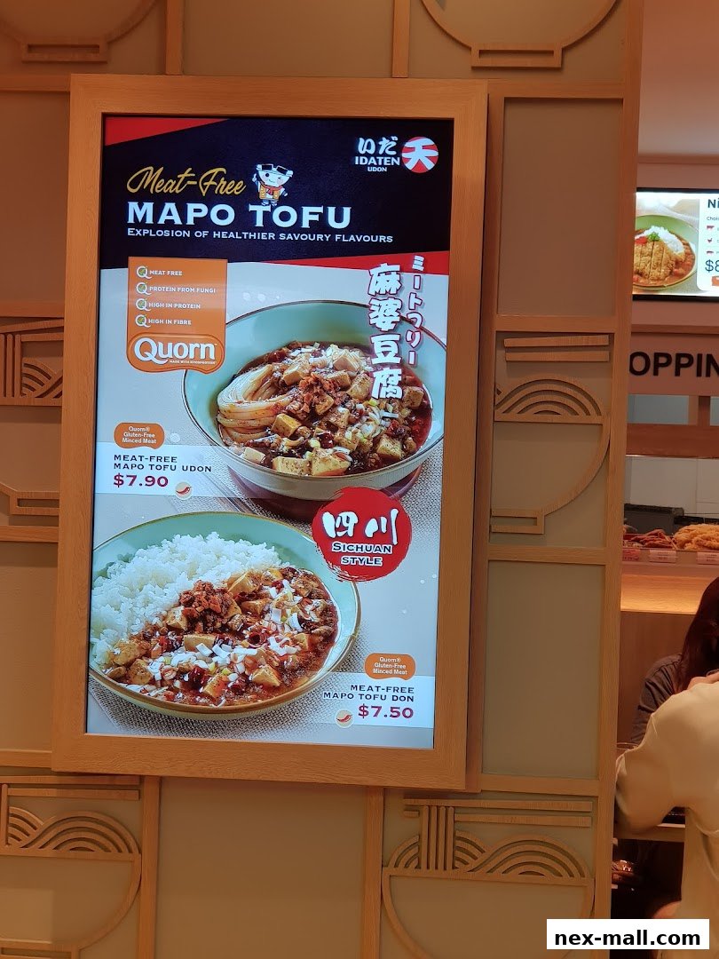 A menu board showcasing meat-free Mapo Tofu Udon and Don from Idaten Udon.