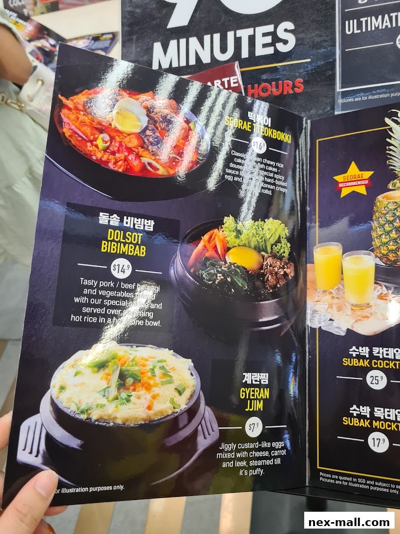A menu featuring Korean dishes like Tteokbokki, Bibimbap, and steamed eggs.