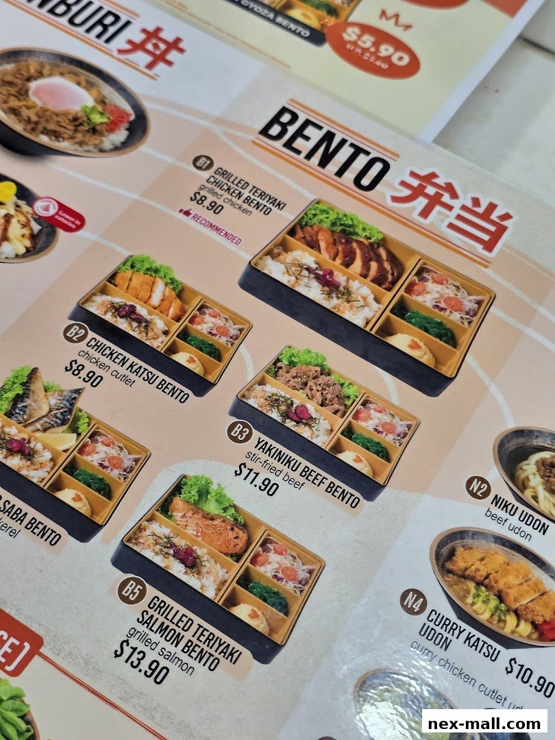 A menu featuring various bento boxes and udon dishes with prices.